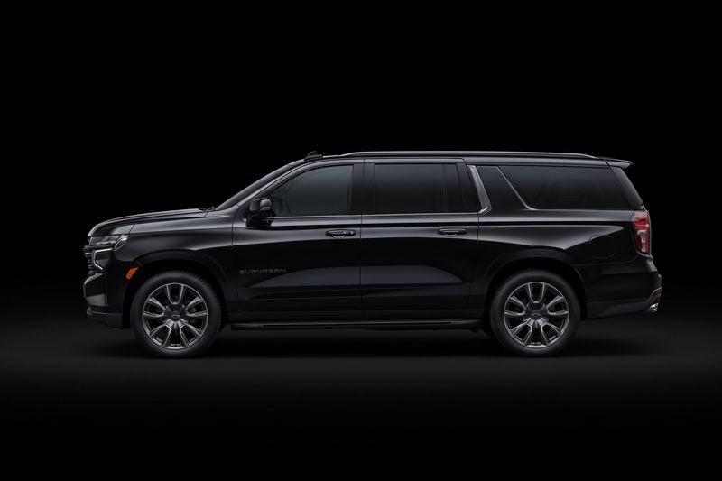 Black full-size Chevrolet Suburban executive SUV